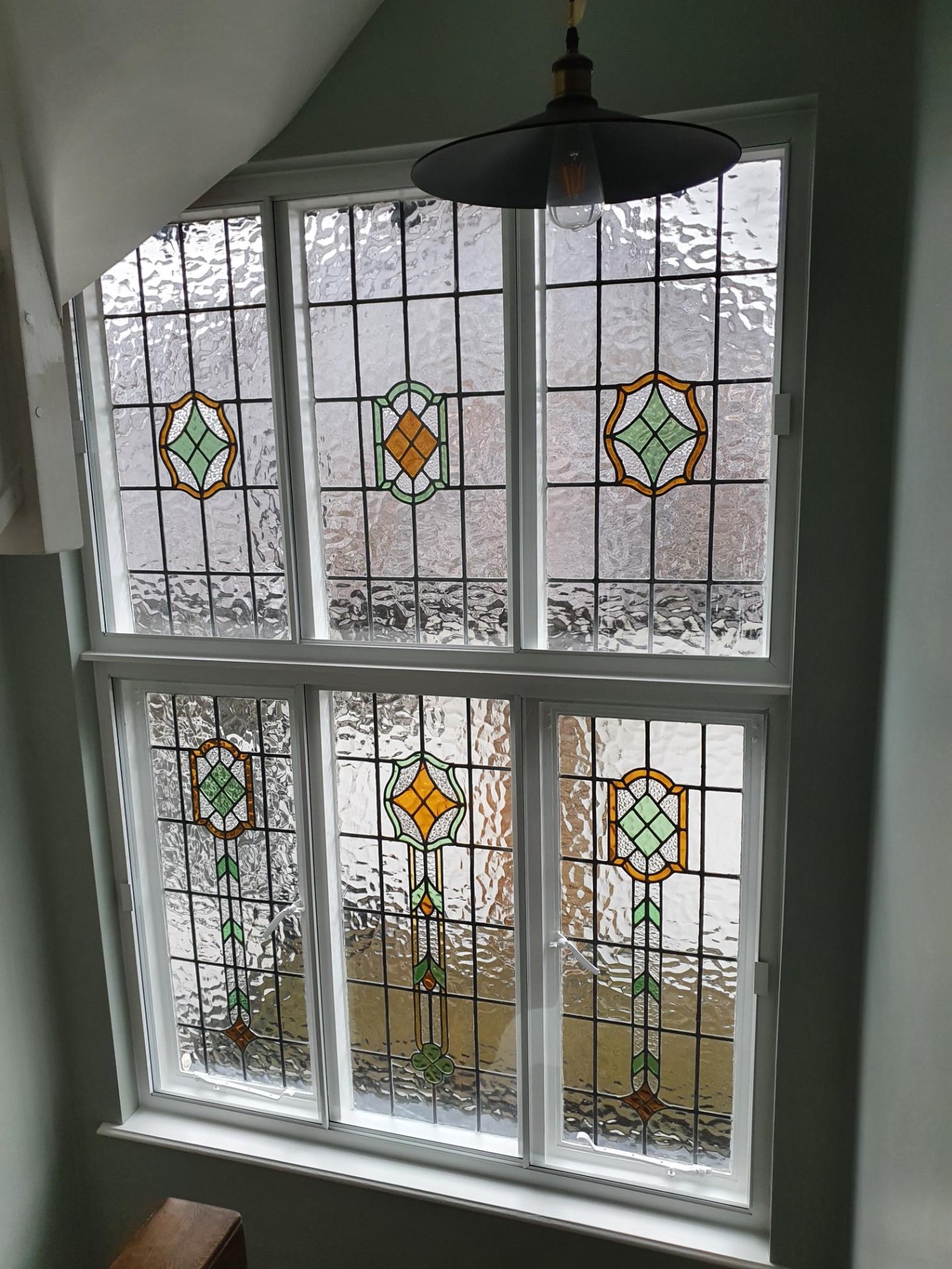Slim-line vertical sliding secondary glazing on heritage sash windows in Hampstead